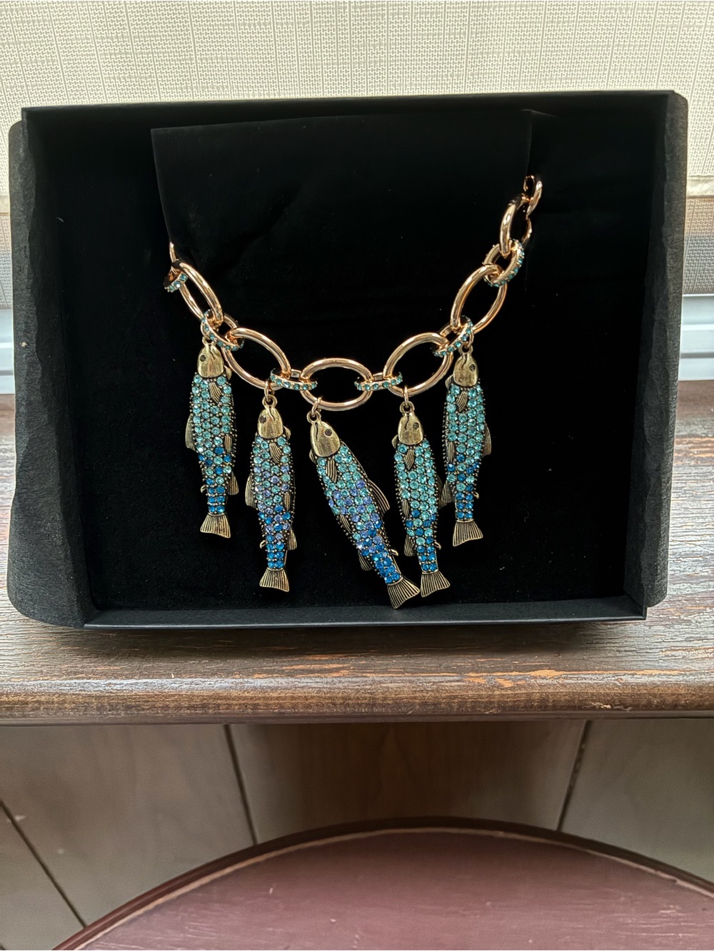 Betsey Johnson Gold-Tone Blue Sardines Necklace with Turquoise Blue Fish Charms - Picture 2 of 2